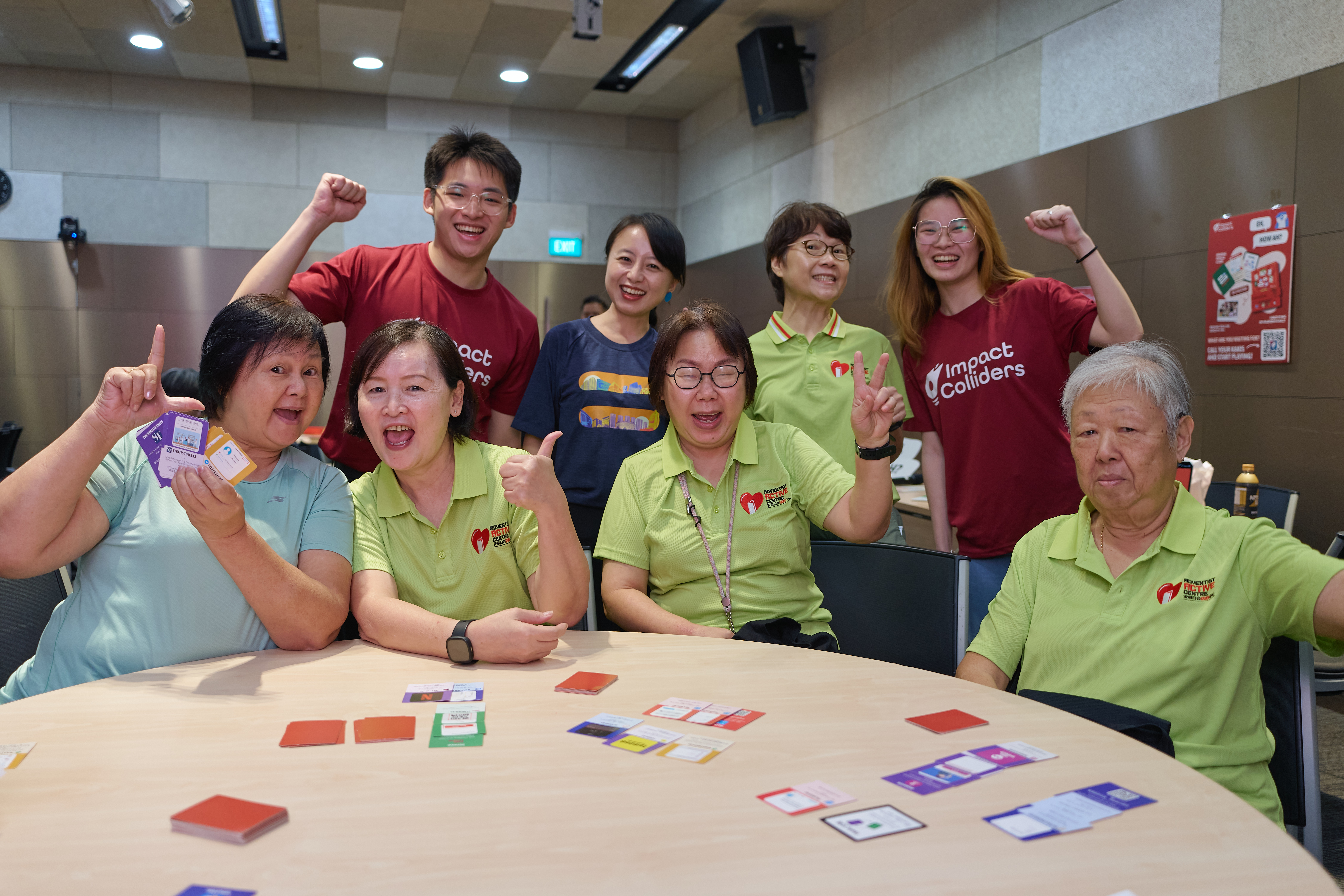 Seniors and volunteers joining an Impact Colliders arts workshop