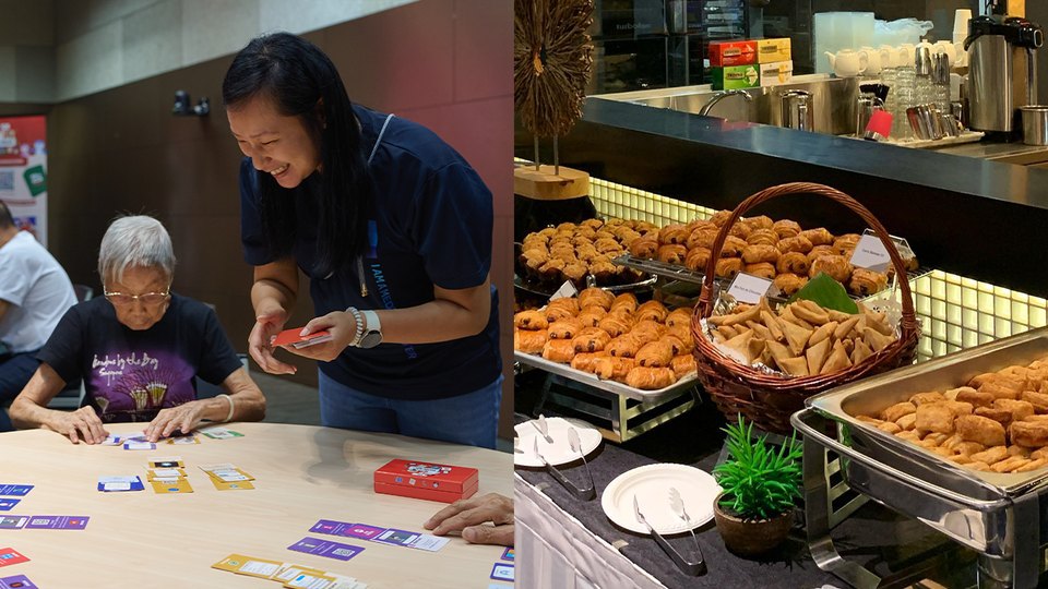 Participants enjoying catered food and the Eh, How Ah? card game