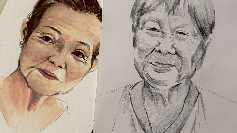 Youth artists drawing hand-drawn portraits of participants